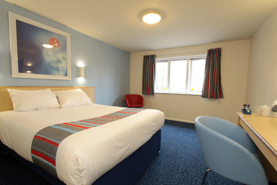 Travelodge Уиднес Номер фото